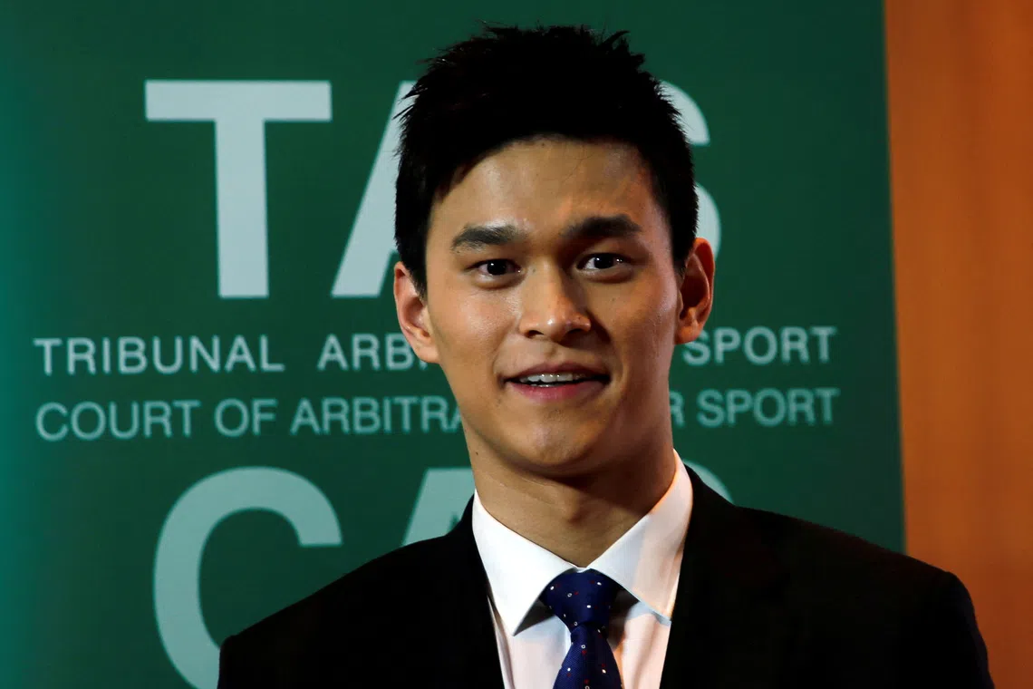FILE PHOTO: Chinese swimmer Sun Yang poses after a public hearing of the Court of Arbitration for Sport (CAS) for the appeal filed by the World Anti-Doping Agency (WADA) against him and the Federation Internationale de Natation (FINA), at the Conference Centre of the Fairmont Le Montreux Palace, in Montreux, Switzerland November 15, 2019. REUTERS/Denis Balibouse/File Photo