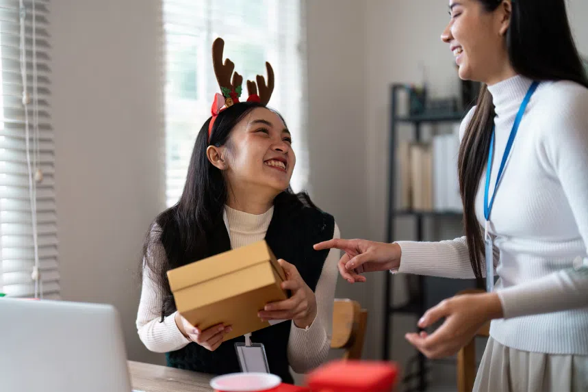 Colleagues exchanging Christmas presents