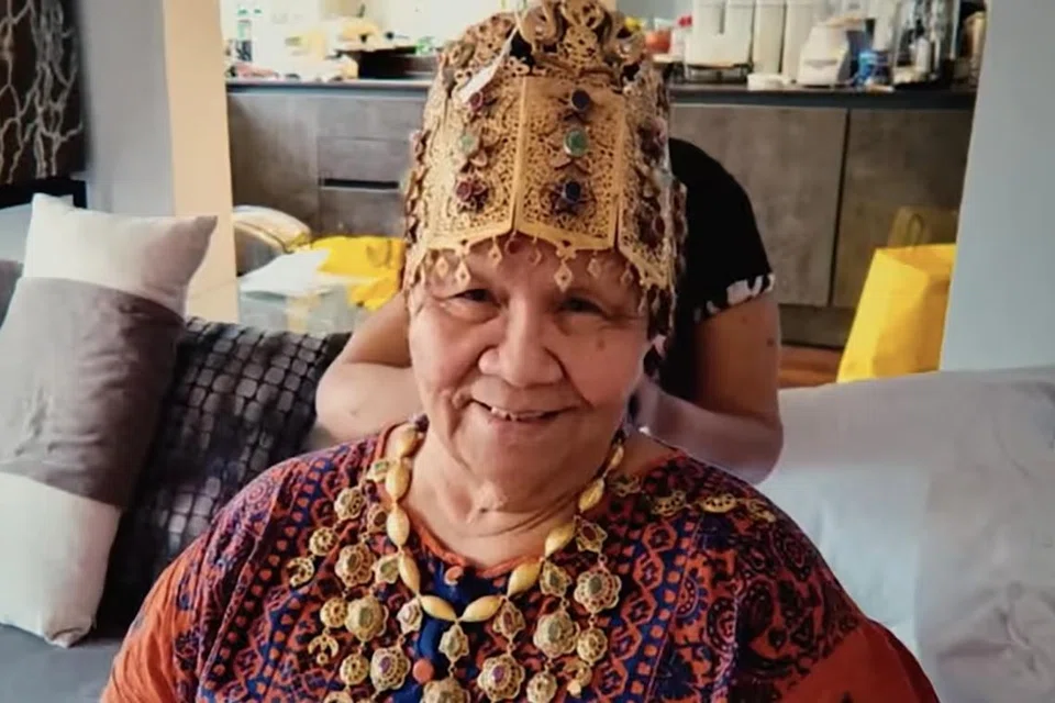 Dionne Marie Hanna, 84, is facing five charges in Singapore for allegedly conning three victims. Photo: Netflix (2025)