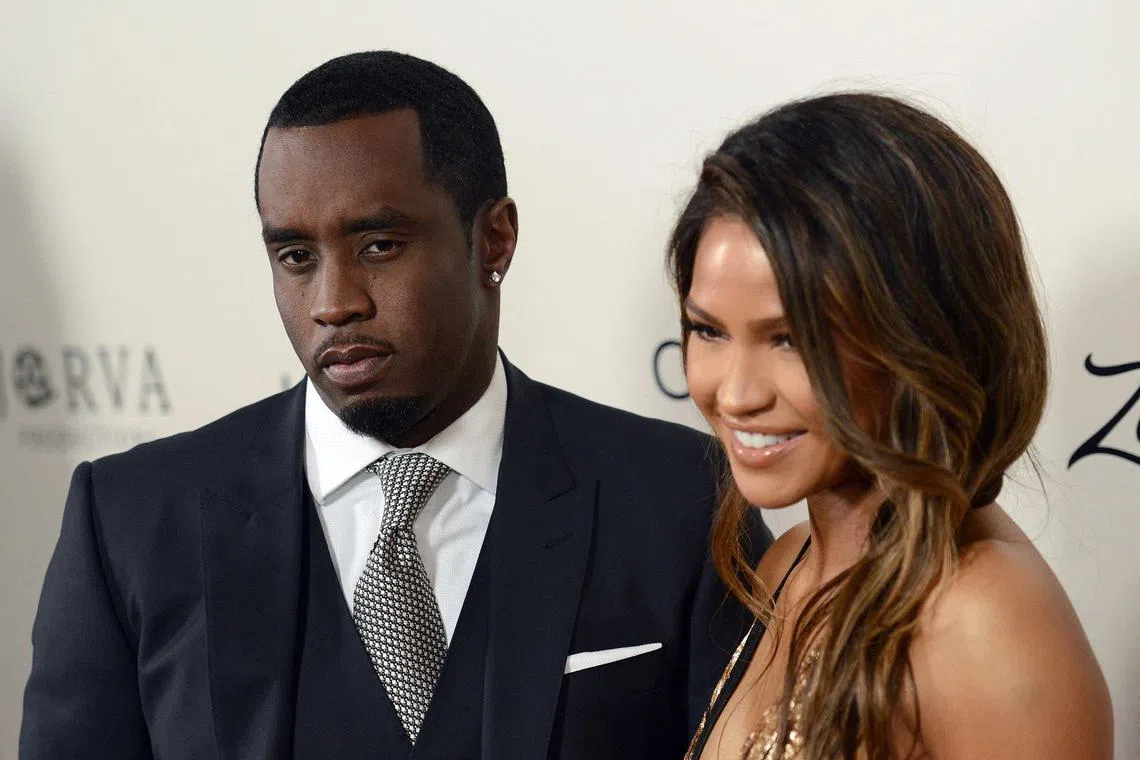 Hip-hop artist and music mogul Sean P. Diddy Combs, seen here with Cassie Ventura in a 2016 photo, was accused of rape and physical abuse by her.
