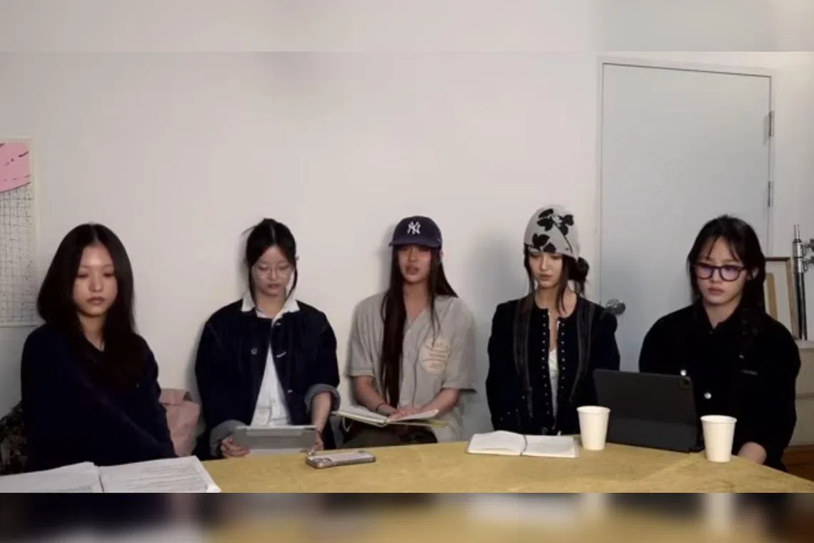 The members of NewJeans (from left: Haerin, Hanni, Hyein, Danielle and Minji) held a surprise YouTube livestream on Sept 11. 
