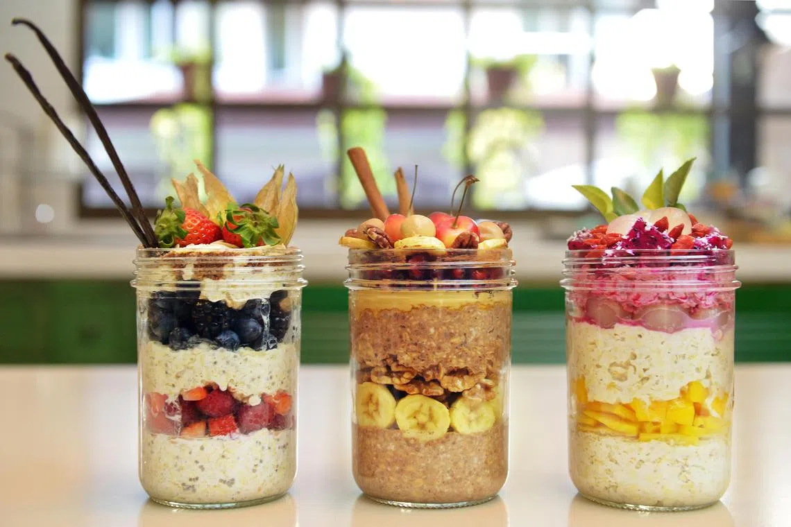 Three jars of berries overnight oats prepared by Ms Melody Chong, a freelancer in public relations and health coaching.