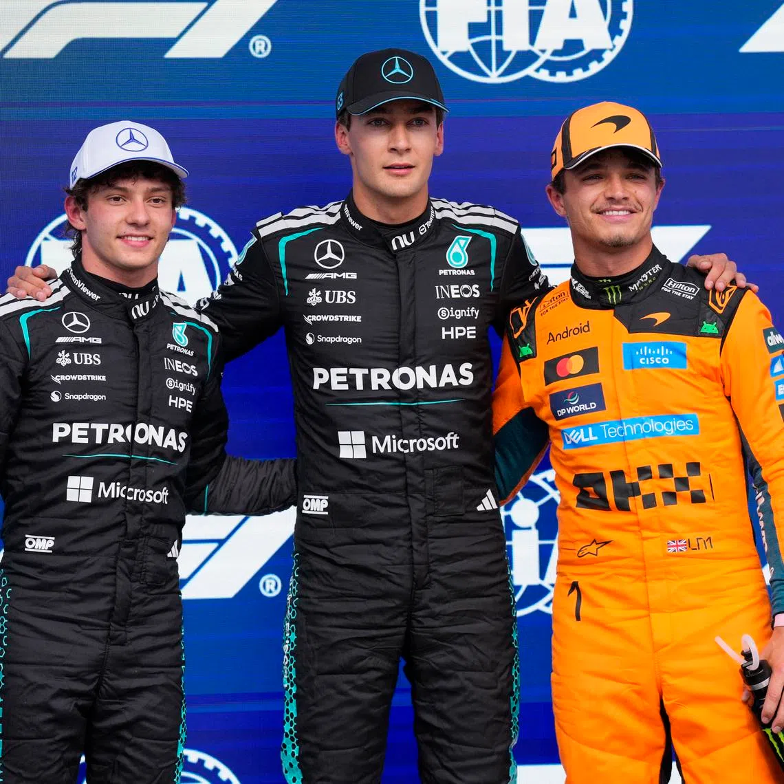 Formula One F1 - Canadian Grand Prix -  Circuit Gilles Villeneuve, Montreal, Quebec, Canada - May 23, 2026 Mercedes' George Russell celebrates after qualifying in pole position with second place Mercedes' Andrea Kimi Antonelli and third place McLaren's Lando Norris