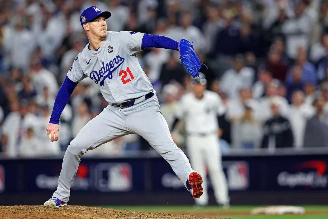Oct 30, 2024; New York, New York, USA; Los Angeles Dodgers pitcher Walker Buehler (21) pitches during the ninth inning against the New York Yankees in game four of the 2024 MLB World Series at Yankee Stadium. Brad Penner-Imagn Images/File Photo