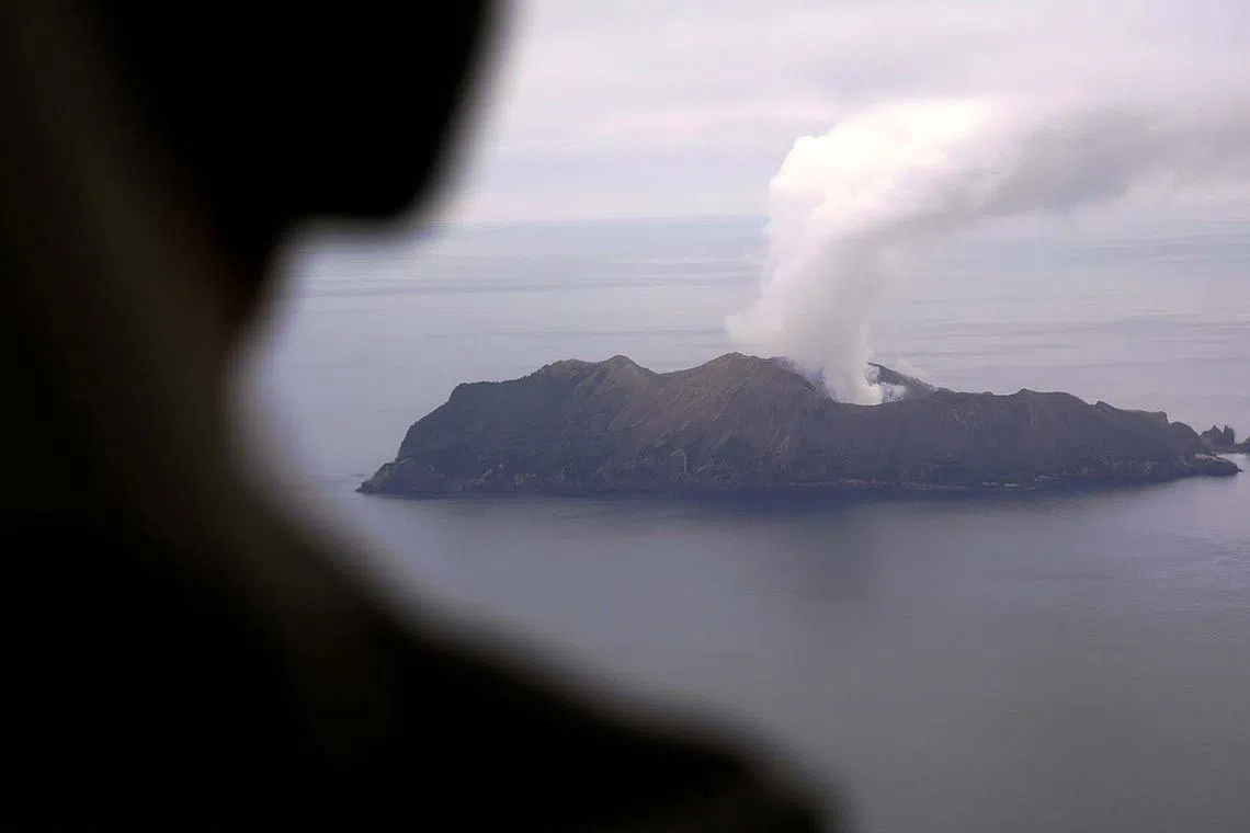 This handout pictured released by the GNS Science on August 22, 2024, shows steam rising from the White Island volcano in Whakatane after a volcanic eruption off the coast from Whakatane on the North Island. (Photo by Handout / GNS SCIENCE / AFP) / RESTRICTED TO EDITORIAL USE - MANDATORY CREDIT "AFP PHOTO / GNS SCIENCE" - NO MARKETING NO ADVERTISING CAMPAIGNS - DISTRIBUTED AS A SERVICE TO CLIENTS