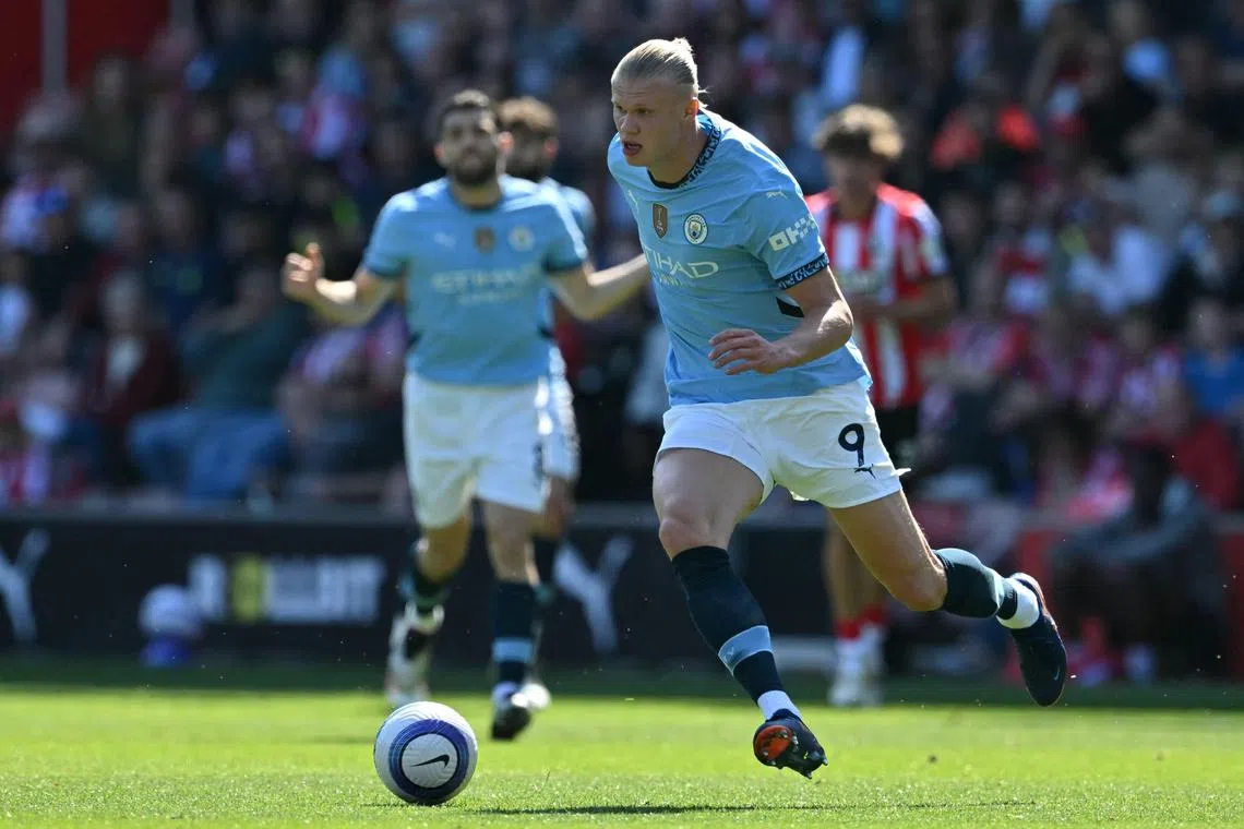 Manchester City's Norwegian striker Erling Haaland running with the ball during the 0-0 English Premier League draw against Southampton at St Mary's on May 10. The striker had been out for nearly six weeks with an ankle injury suffered in March. 