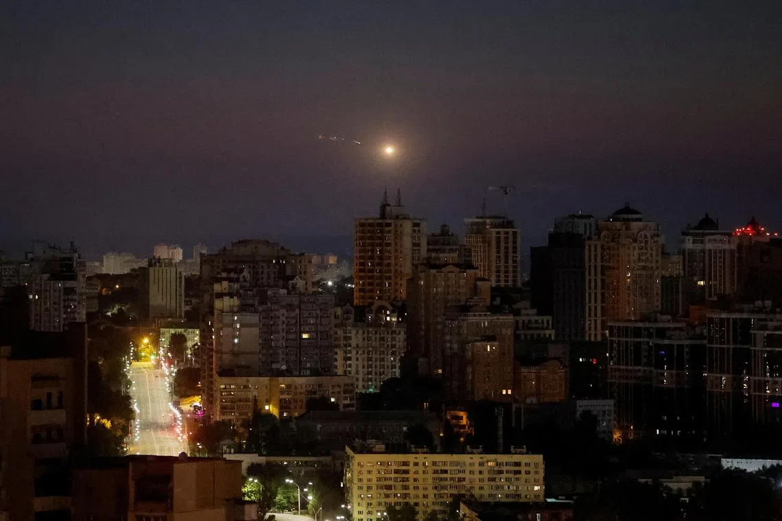 A drone explodes in the sky over Kyiv  during a Russian drone strike on July 25. The Ukrainian capital was again under attack on Aug 11, with air defence systems engaged. 