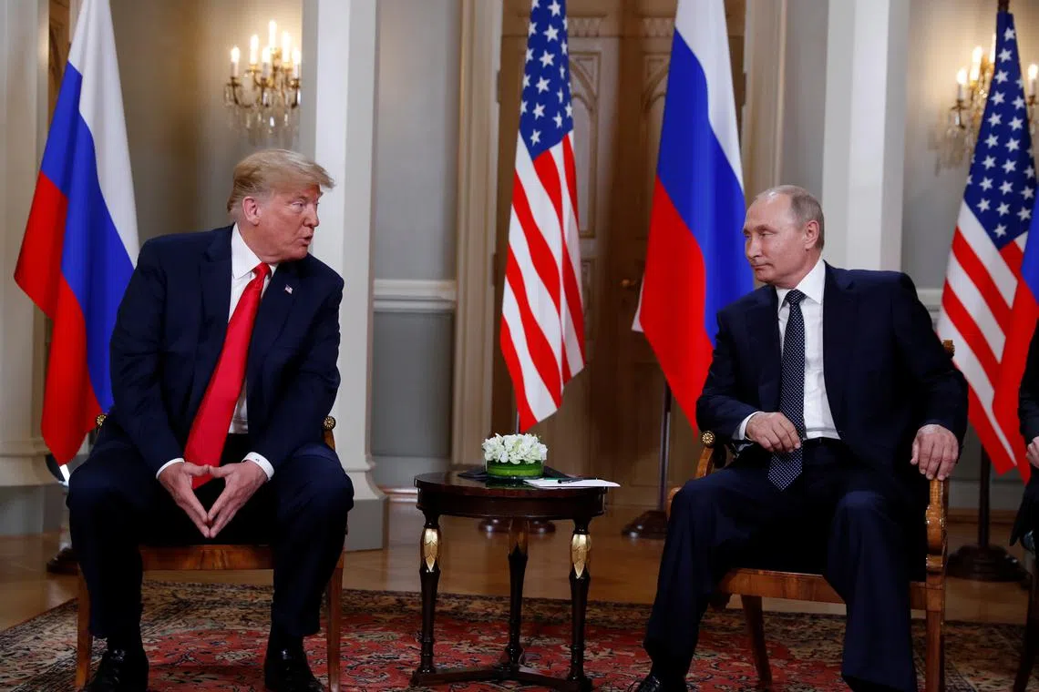 FILE PHOTO: U.S. President Donald Trump meets with Russia's President Vladimir Putin in Helsinki, Finland, July 16, 2018. REUTERS/Kevin Lamarque/File Photo