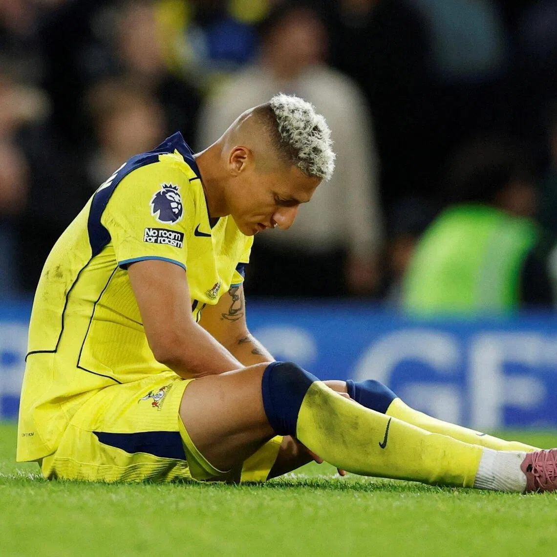 Tottenham Hotspur's Richarlison sitting on the pitch dejected after his side's 2-1 defeat by Chelsea on May 19, when he scored Spurs' only goal. 