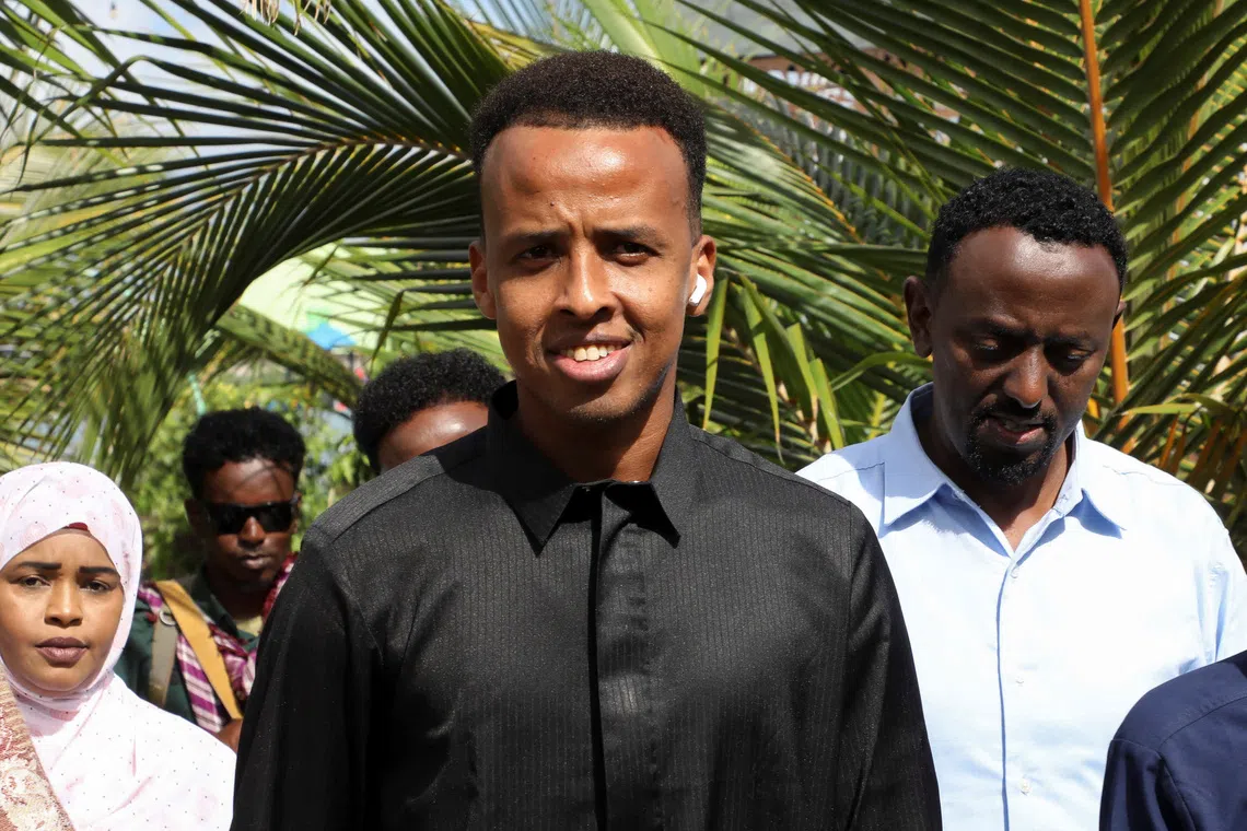FILE PHOTO: Somali referee Omar Abdulkadir Artan, who was expected to officiate at matches during the 2026 FIFA World Cup but was denied entry to U.S., is hosted in a reception ceremony by members of the Somali community of Dayniile district, in Mogadishu, Somalia June 12, 2026 REUTERS/Feisal Omar/ File Photo
