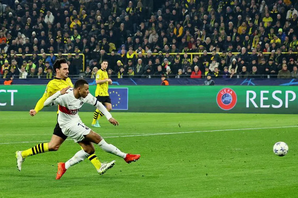 Soccer Football - Champions League - Group F - Borussia Dortmund v Paris St Germain - Signal Iduna Park, Dortmund, Germany - December 13, 2023 Paris St Germain's Kylian Mbappe scores a goal before it was disallowed REUTERS/Wolfgang Rattay