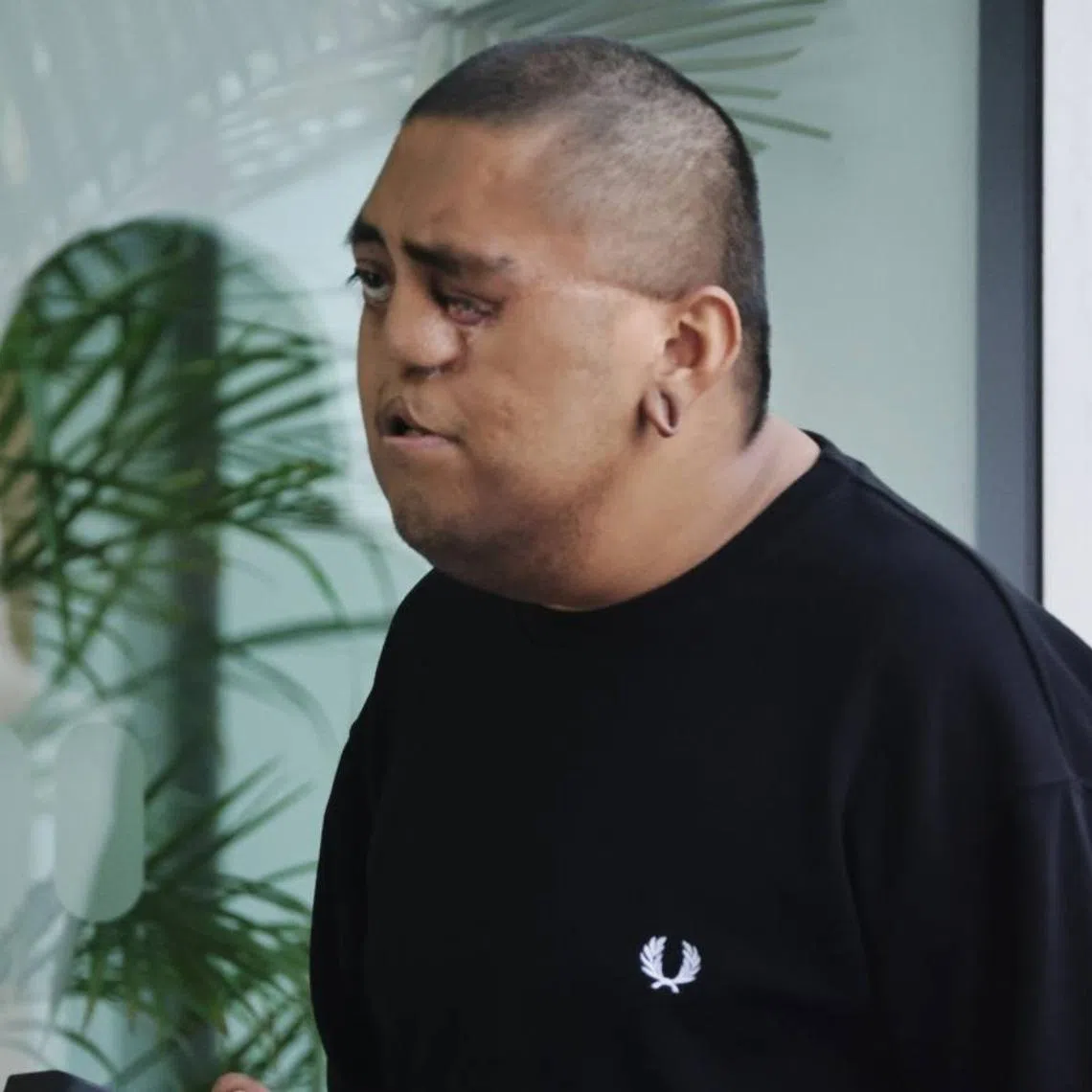 Muhammad Asyraf Said, 30, who is a Singaporean, is accused of committing the offence against Alan Sim, 55, at a bus stop in Rivervale Drive in Sengkang on Oct 27, 2025.