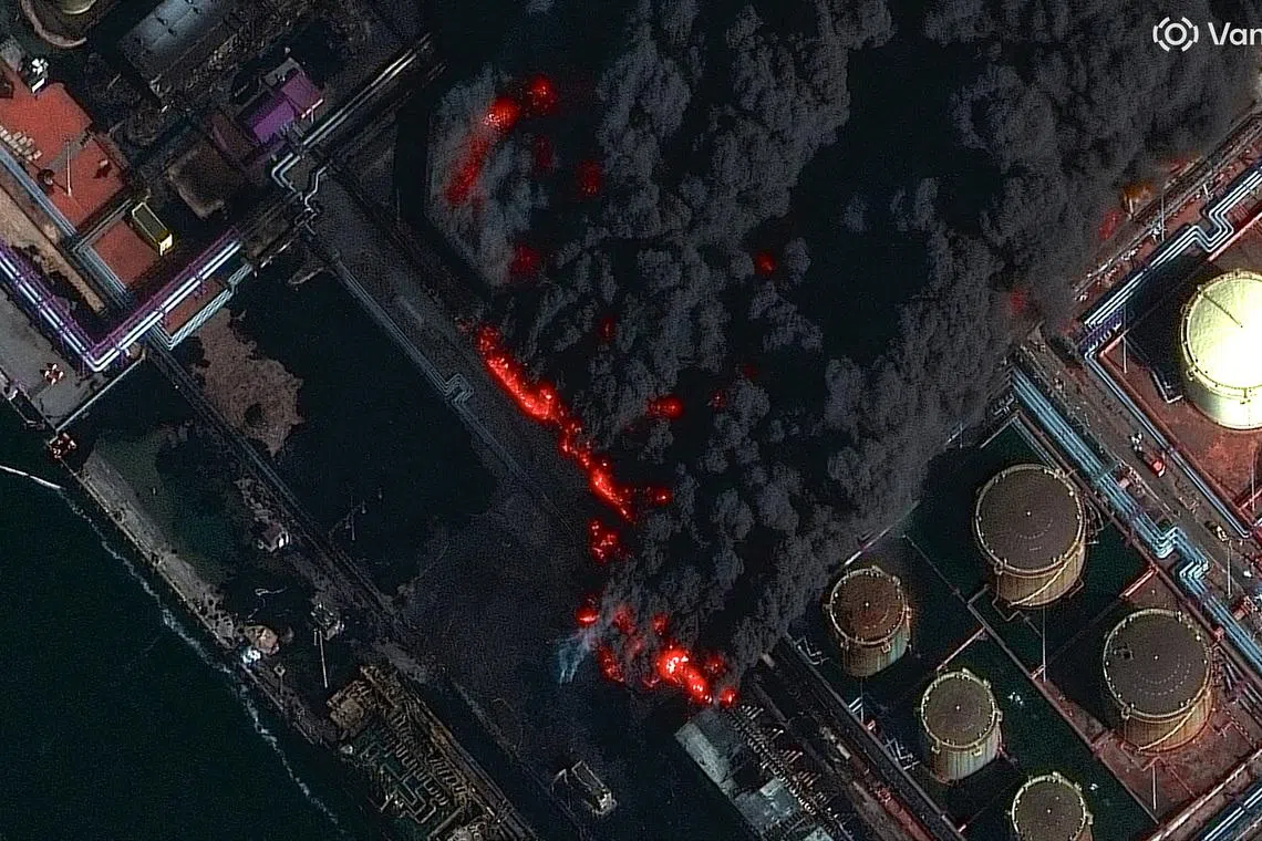 FILE PHOTO: A satellite near-infrared image shows smoke rising from Russia's Baltic port of Ust-Luga after a Ukrainian attack, in Ust-Luga, Leningrad Oblast, March 27, 2026. Vantor/Handout via REUTERS/File Photo