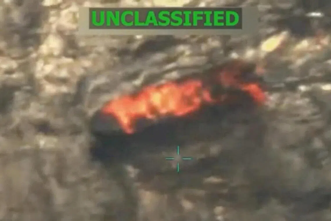 A vessel burns in this still image taken from a video released Sept 15, depicting an alleged strike on a Venezuelan drug cartel vessel.