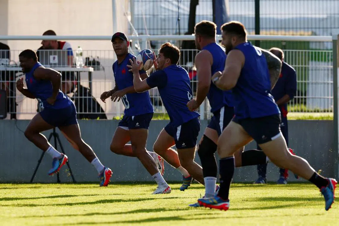 Rugby Union - Rugby World Cup 2023 - France Training - Stade Du Parc, Rueil-Malmaison, France - October 10, 2023 France's Antoine Dupont with teammates during training REUTERS/Gonzalo Fuentes/File Photo