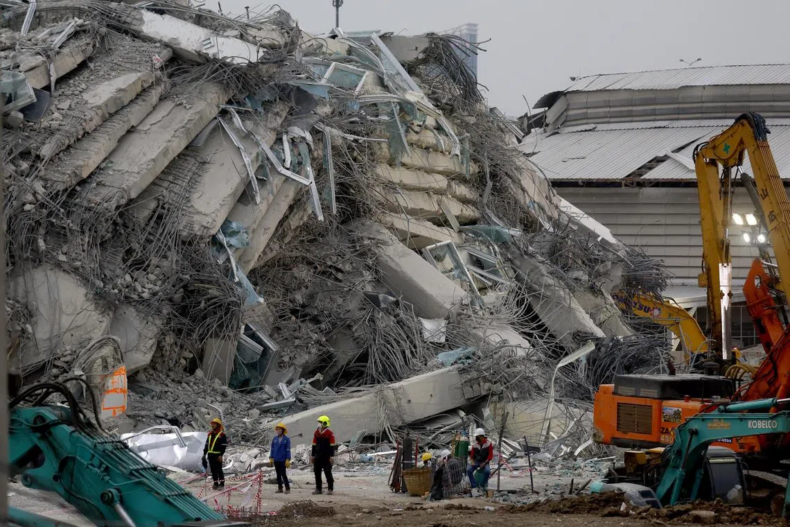 Rescue workers carry out a search operation at the site of a building that collapsed following an earthquake in Bangkok, Thailand, on March 30, 2025. 
