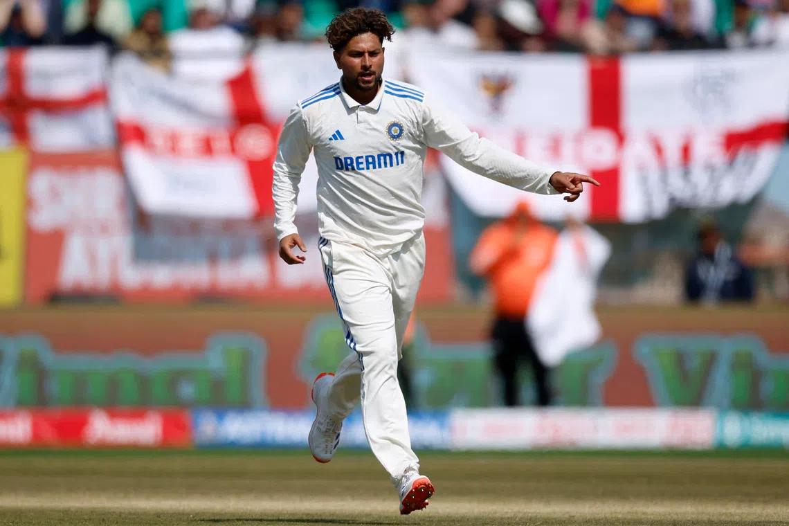 Cricket - Fifth Test - India v England - Himachal Pradesh Cricket Association Stadium, Dharamshala, India - March 7, 2024 India's Kuldeep Yadav celebrates his five-wicket-haul after taking the lbw wicket of England's Ben Stokes REUTERS/Adnan Abidi