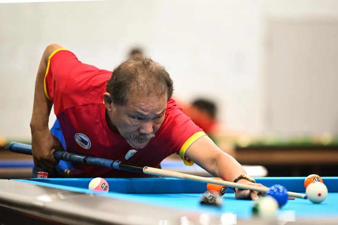 ST20230507-202357311692-Lim Yaohui-dlefren/
Efren Reyes from Philippines training at Aeon Hall on May 7, 2023.
Filipino pool legend Efren Reyes' first SEA Games was in Jakarta in 1987 and he is still at it at the age of 68 as he is scheduled to compete in the men's 3-cushions carom singles in Cambodia.
The 2023 Southeast Asian Games, commonly known as the 32nd Southeast Asian Games, or the 32nd SEA Games, and commonly known as Cambodia 2023, will be the 32nd edition of the Southeast Asian Games, a biennial sports multi-sport event which will be held from 5 to 17 May 2023 in Phnom Penh, Cambodia.
(ST PHOTO: LIM YAOHUI)