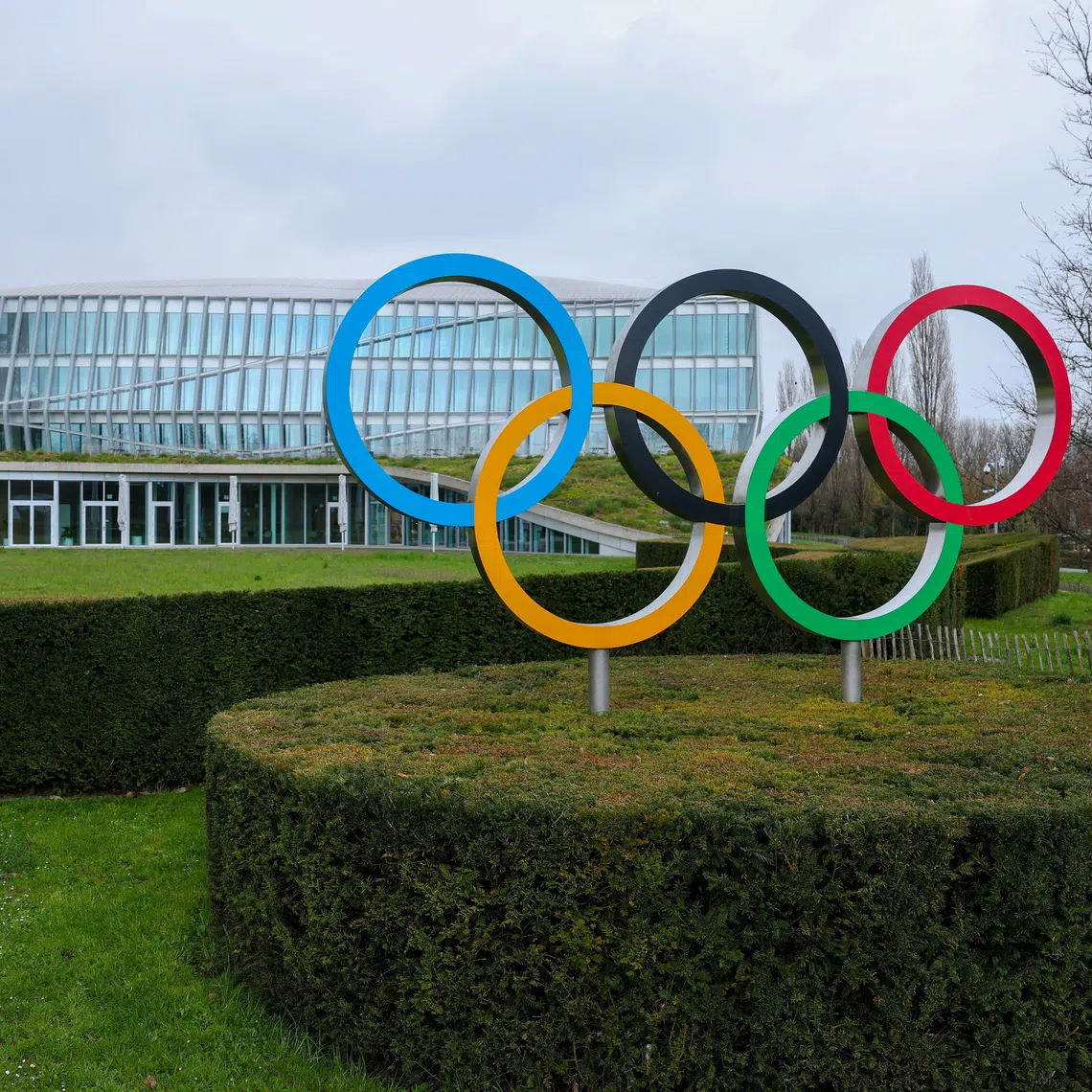Olympic rings are pictured outside the International Olympic Committee (IOC) during an Executive Board meeting at the Olympic House in Lausanne, Switzerland, March 26, 2026. REUTERS/Denis Balibouse
