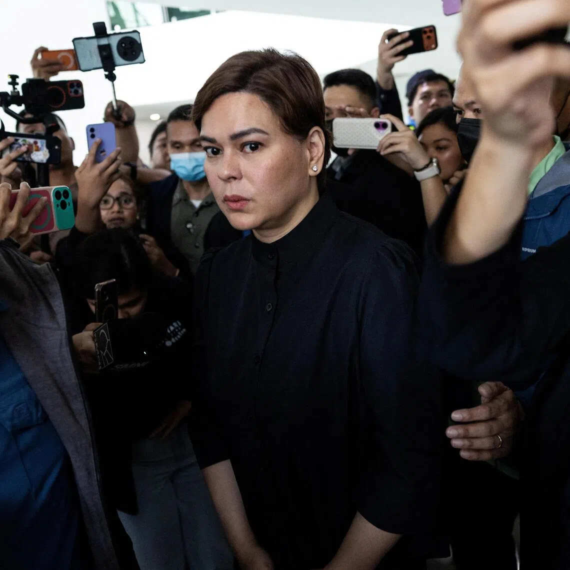 Philippine Vice-President Sara Duterte leaving the Quezon City Regional Trial Court after posting bail on Sept 5.