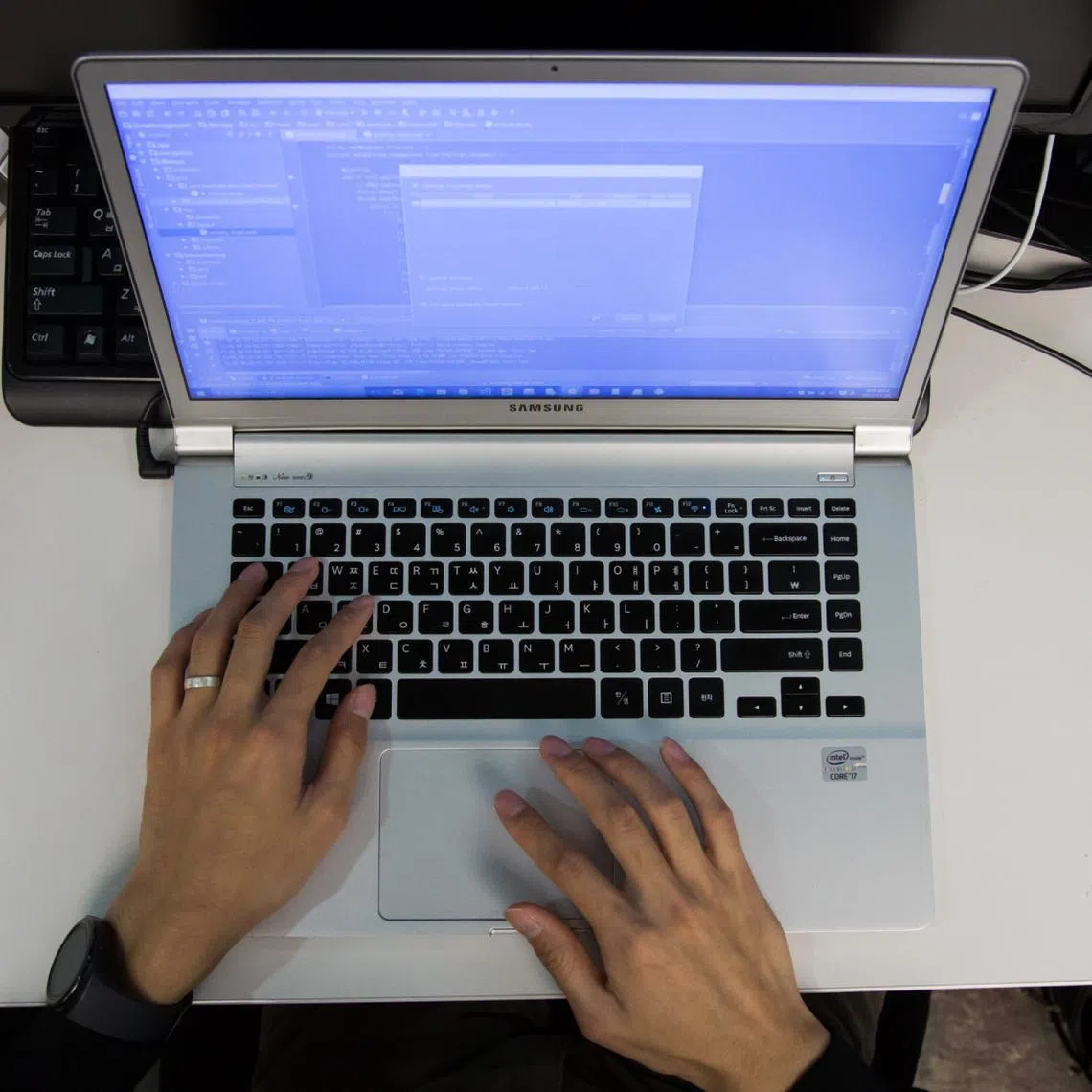 As ChatGPT-like generative AI changes how code is written, companies are rethinking how many programmers they need.