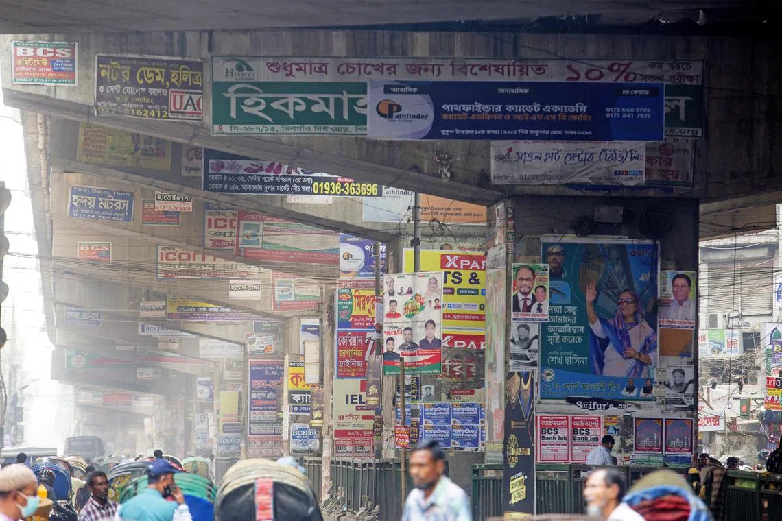 Posters are attached to the columns and walls of an overpass in Dhaka, Bangladesh, Feb 17 2023. The Bangladesh High Court ordered to remove all graffiti and posters from all flyovers in Dhaka within the next two weeks to match the Graffiti Writing and Poster Sticking Control Act 2012, which allows graffiti or posters only to be put up at designated spaces and prohibits them to be pasted at any other place. 