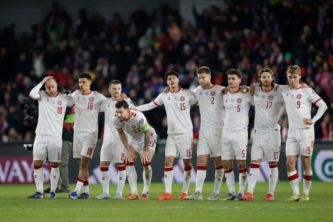 Soccer Football - FIFA World Cup - UEFA Qualifiers - Finals - Czech Republic v Denmark - epet ARENA, Prague, Czech Republic - March 31, 2026 Denmark players look dejected during the penalty shootout REUTERS/David W Cerny