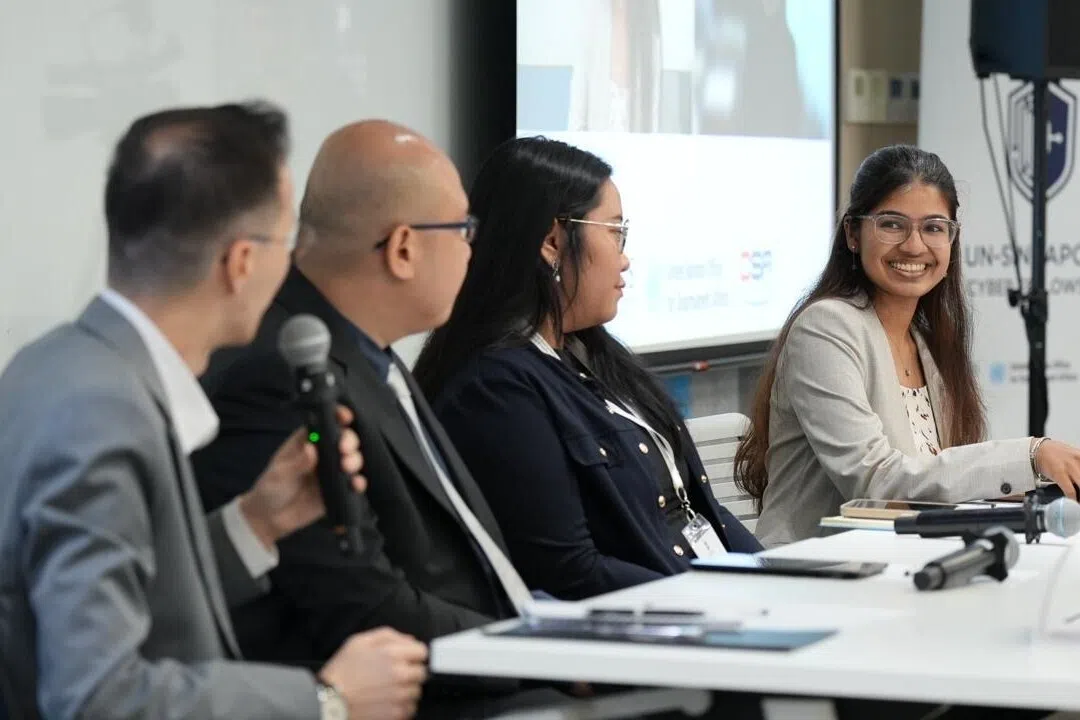 defence merit scholar keloth sonia seated far right with fellow participants during the 2025 united nations singapore cyber fellowship