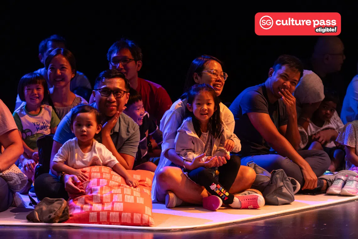 families enjoying theatre