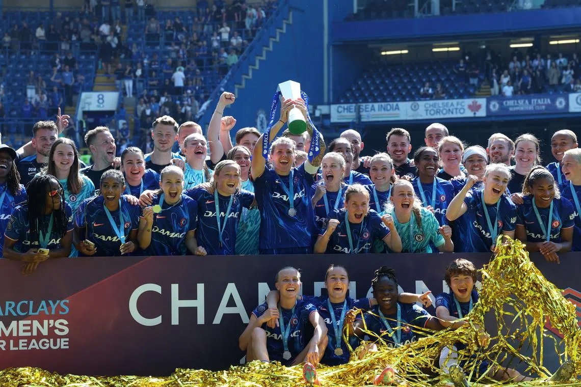 FILE PHOTO: Soccer Football - Women's Super League - Chelsea v Liverpool - Stamford Bridge, London, Britain - May 10, 2025 Chelsea's Millie Bright lifts the trophy as she celebrates with teammates after winning the Women's Super League Action Images via Reuters/Paul Childs/File Photo