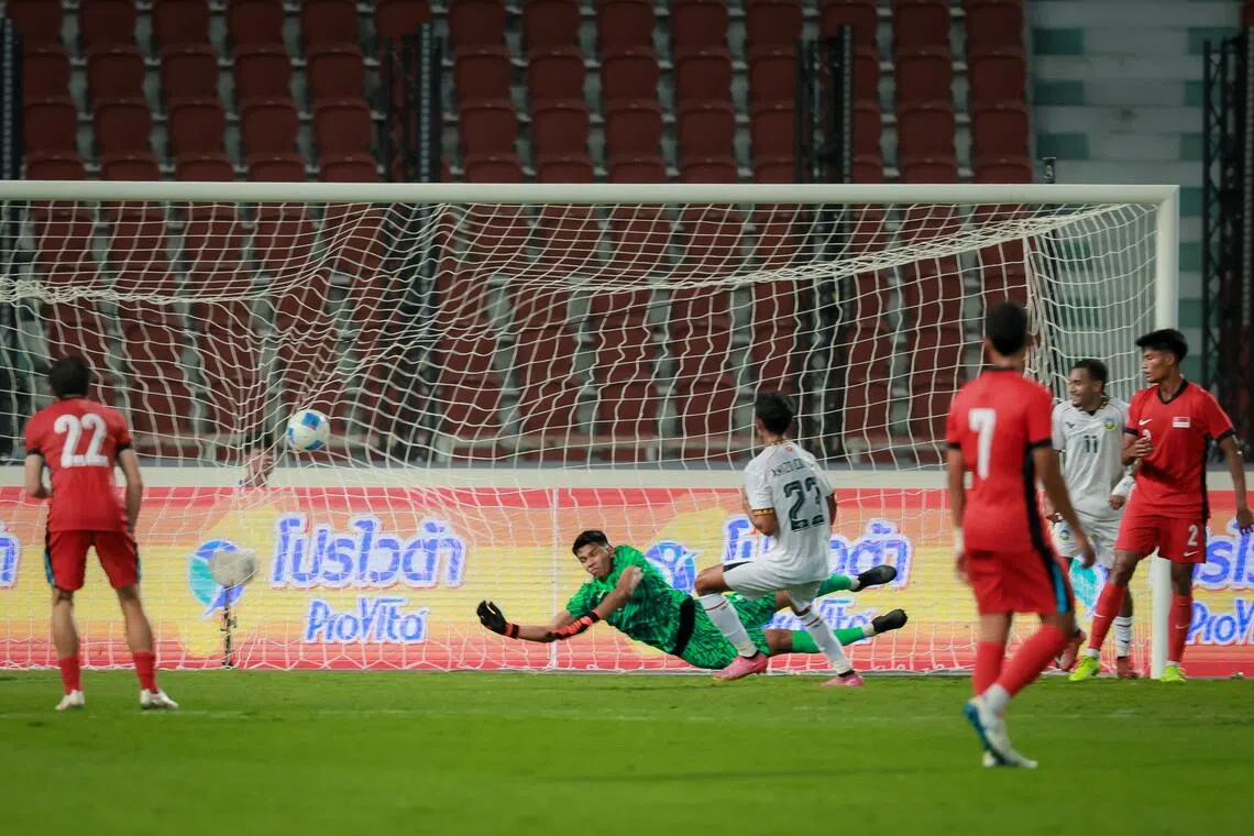 Timor-Leste scoring against Singapore in their SEA Games group match at the Rajamangala National Stadium on Dec 6.