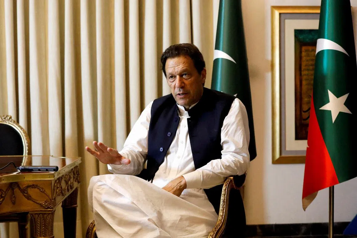 FILE PHOTO: Former Pakistani Prime Minister Imran Khan speaks with Reuters during an interview, in Lahore, Pakistan March 17, 2023. REUTERS/Akhtar Soomro/File Photo