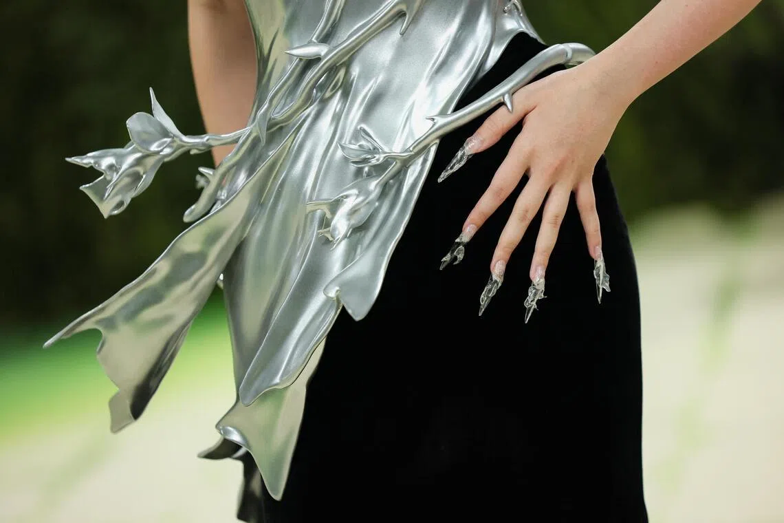Grace Ling’s answer to the Fashion Is Art theme was a silver-toned bodice that looked thorny and windswept.