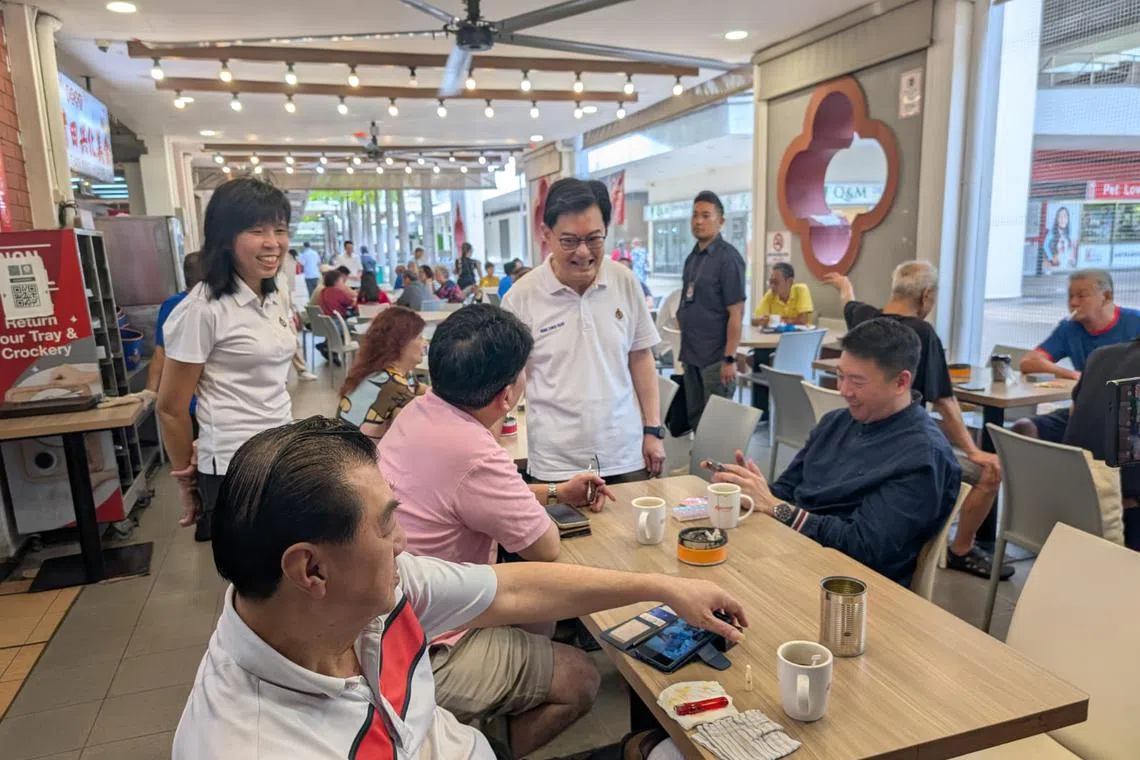 DPM Heng Swee Keat at a morning walkabout at Simei Plaza on March 15.