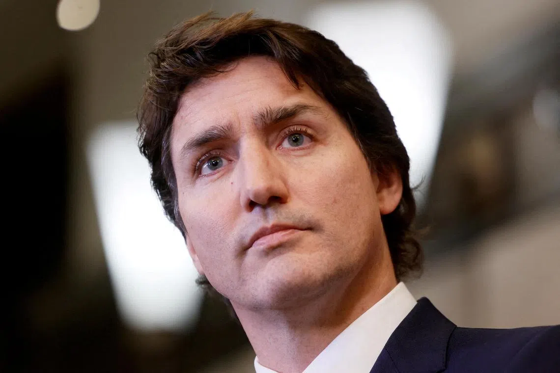 Canada's Prime Minister Justin Trudeau was hit by a handful of gravel in 2021 while on the campaign trail as he made his way past a crowd shouting their opposition to COVID-19-related mandates and restrictions.