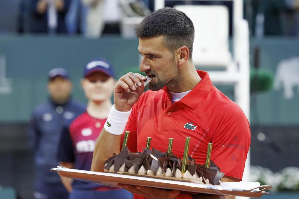 Serbia's Novak Djokovic was presented with a birthday cake by the Geneva Open organisers, after his 6-3 6-3 win over German Yannick Hanfmann.