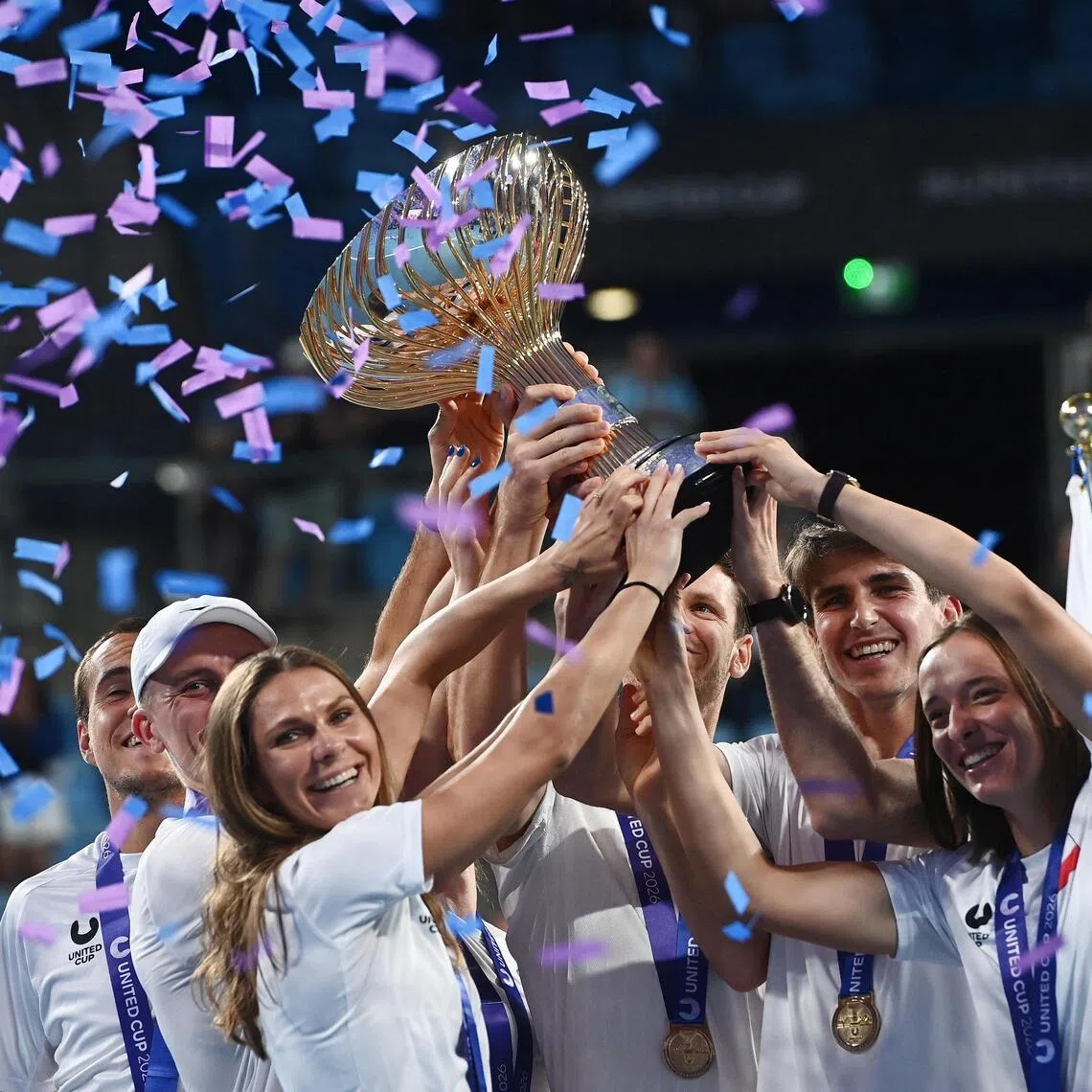 Poland's players celebrating with the trophy after winning the United Cup.