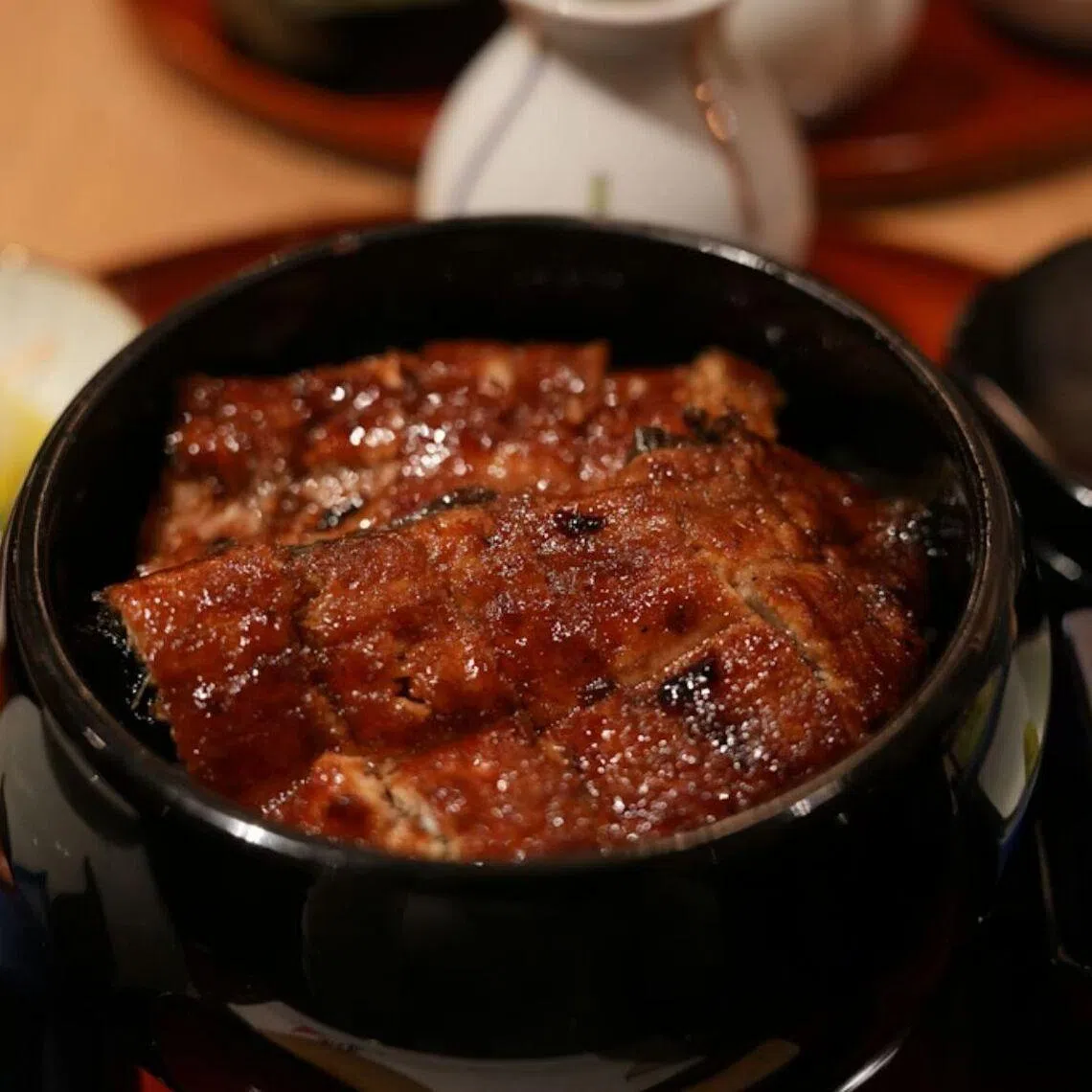 Eel is eaten worldwide, but is particularly popular in Japan, where it is traditionally served grilled and covered in a sticky-sweet sauce.