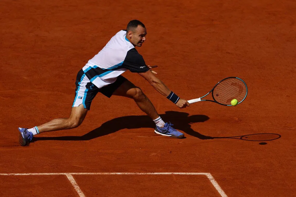 Tennis - French Open - Roland Garros, Paris, France - May 25, 2025 Russia's Roman Safiullin in action during his first round match against France's Frances Tiafoe REUTERS/Lisi Niesner