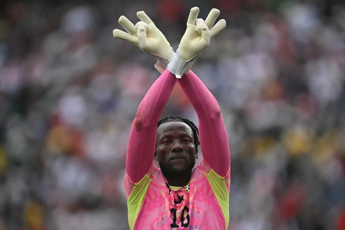 Ghana's goalkeeper Benjamin Asare celebrating the 0-0 draw with England at the Boston Stadium in Foxborough on June 23.