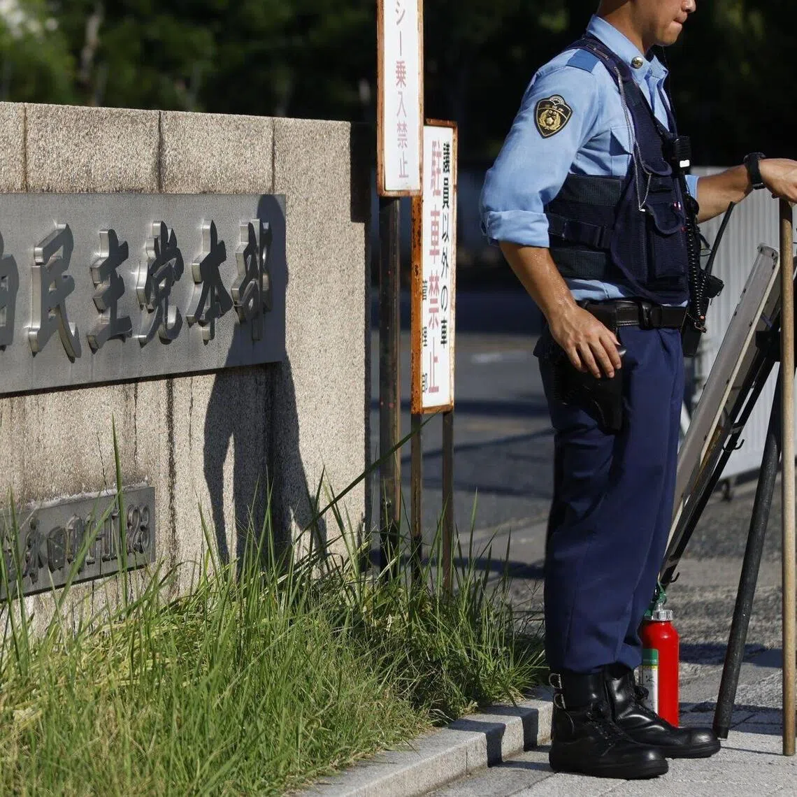 Signage outside the Liberal Democratic Party (LDP) headquarters in Tokyo, Japan, on Monday, Sept. 8, 2025. Japan’s ruling party faces a tough decision over its future as it searches for a new leader to replace outgoing Prime Minister Shigeru Ishiba, stop the slide in its support at the polls and reassure investors. Photographer: Kiyoshi Ota/Bloomberg