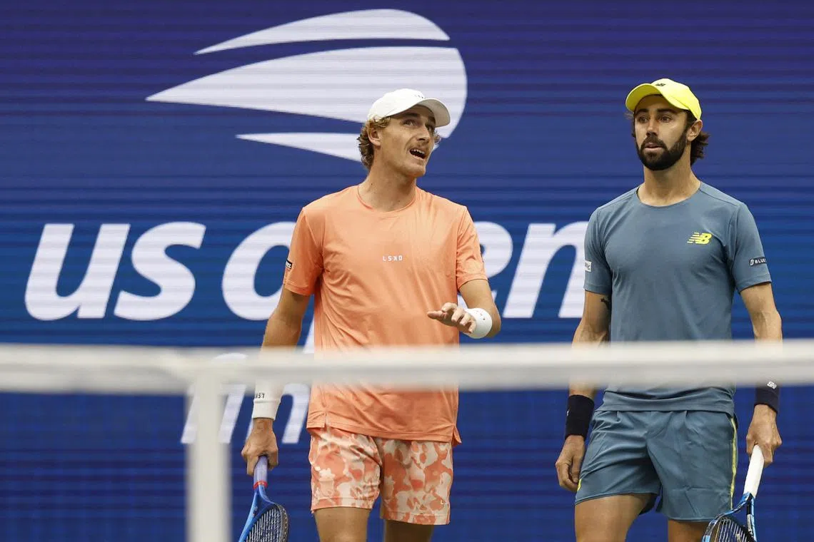 FILE PHOTO: Sep 7, 2024; Flushing, NY, USA; Max Purcell (AUS)(L) and Jordan Thompson (AUS)(R) talk between points against Kevin Krawietz (GER) and Tim Puetz (GER)(both not pictured) in the men's doubles final on day thirteen of the 2024 U.S. Open tennis tournament at USTA Billie Jean King National Tennis Center. Mandatory Credit: Geoff Burke-Imagn Images/File Photo