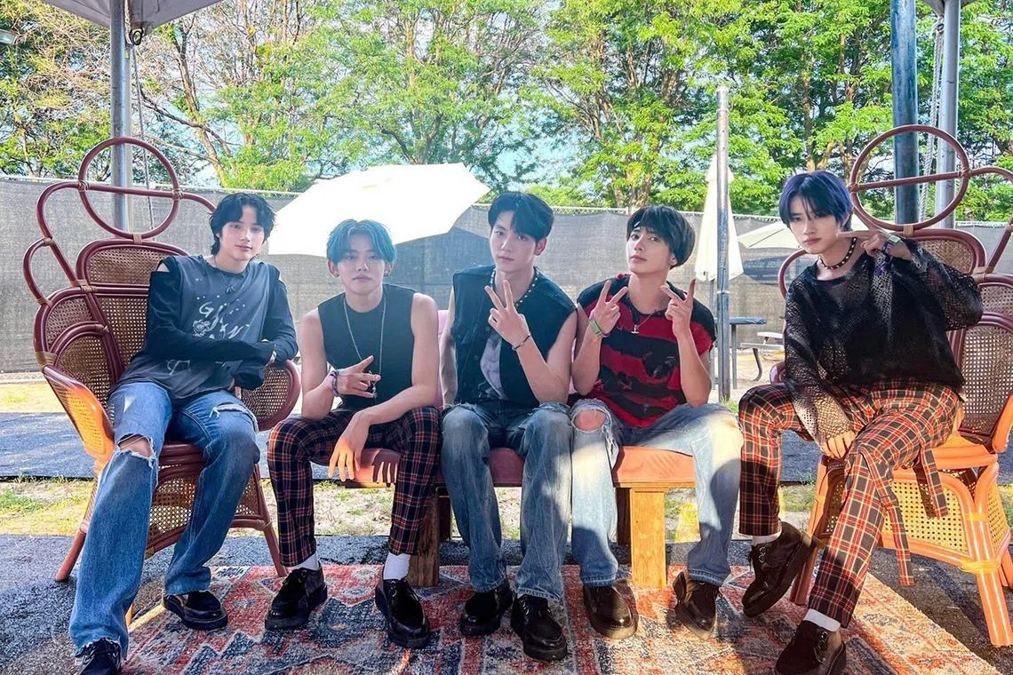 Tomorrow X Together (from left) Hueningkai, Yeonjun, Soobin, Taehyun and Beomgyu) performing at Lollapalooza in 2022.