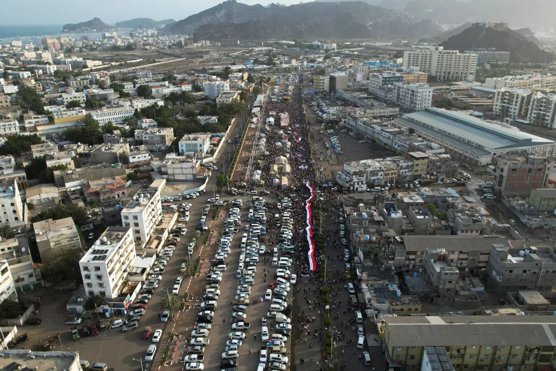 A drone view shows people attending a rally organised by Yemen's main separatist group, the Southern Transitional Council (STC), in Aden, Yemen December 21, 2025. REUTERS/Fawaz Salman