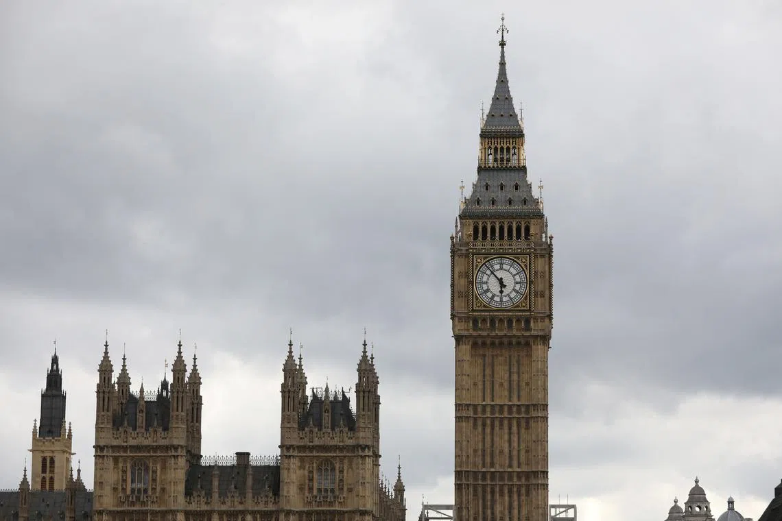 FILE PHOTO: Clouds hang above the Houses of Parliament in central London, Britain, June 24, 2017. REUTERS/Marko Djurica/File Photo