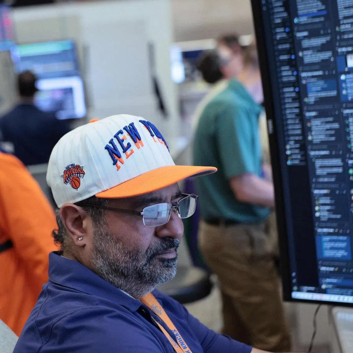 Traders working on the floor of the New York Stock Exchange during afternoon trading on June 10, in New York City.