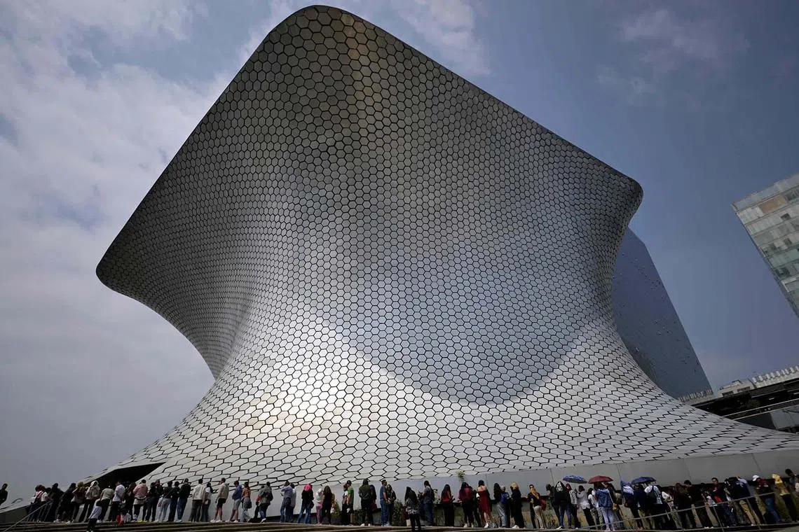 People lining up to visit the Soumaya Museum in Mexico City on Oct 13, 2024. 