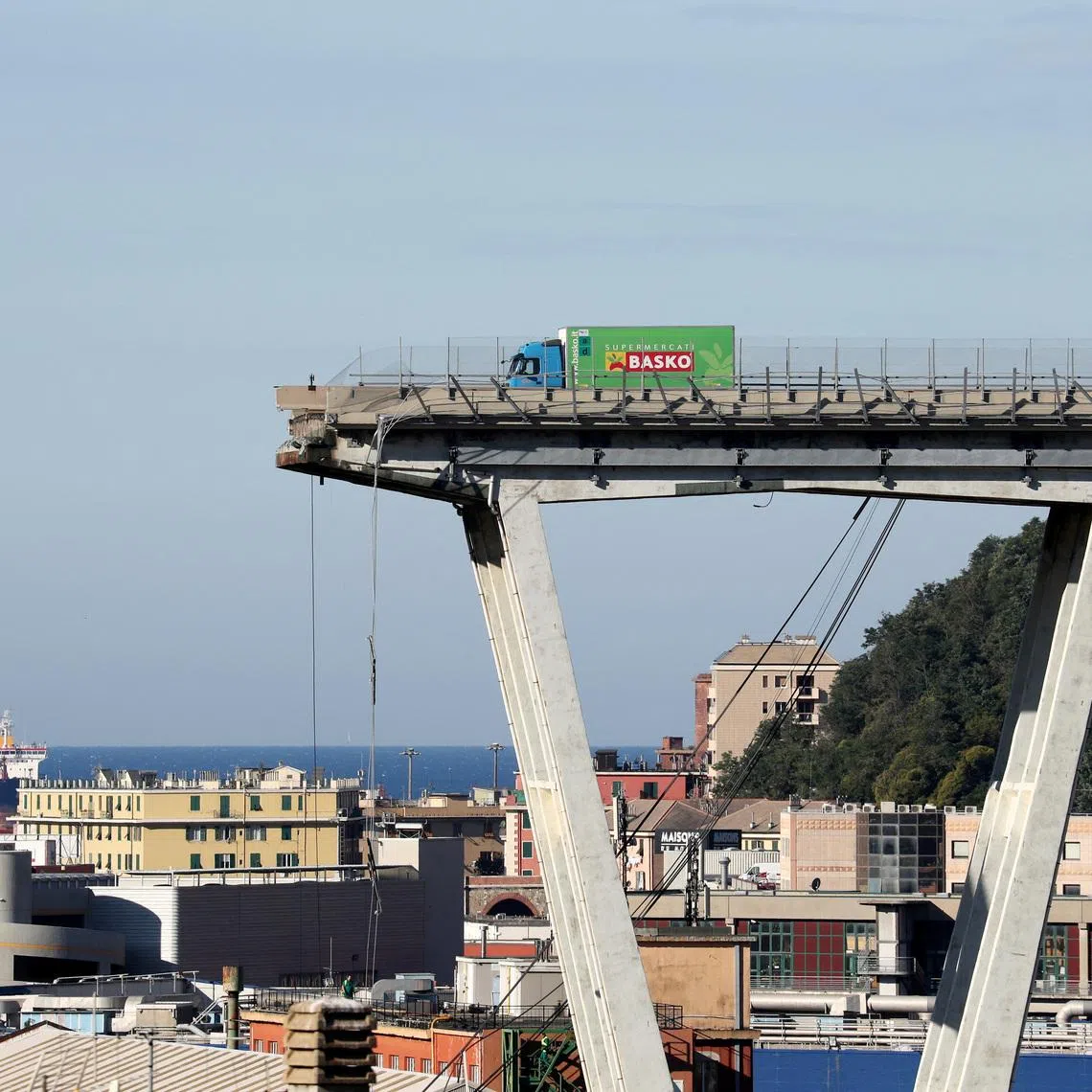 FILE PHOTO: The collapsed Morandi Bridge is seen in the Italian port city of Genoa, Italy August 15, 2018.  REUTERS/Stefano Rellandini/File Photo