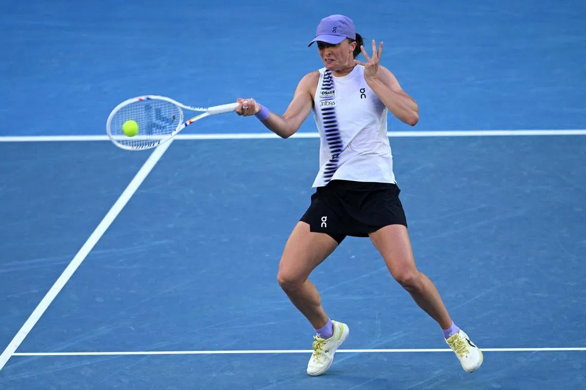 Tennis - Australian Open - Melbourne Park, Melbourne, Australia - January 26, 2026 Poland's Iga Swiatek in action during her fourth round match against Australia's Maddison Inglis REUTERS/Jaimi Joy