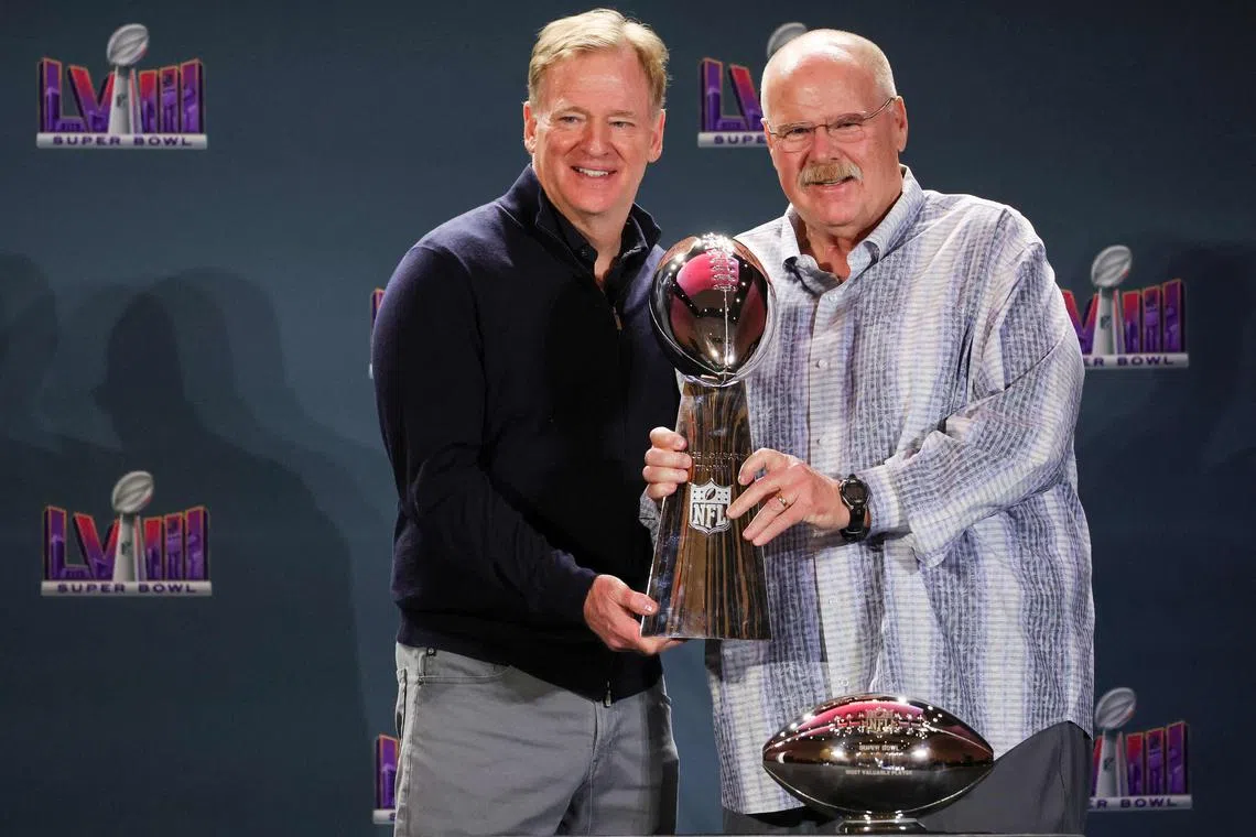 National Football League commissioner Roger Goodell (left) handing the Vince Lombardi Trophy to Kansas City Chiefs coach Andy Reid during a press conference at the Mandalay Bay Convention Centre on Feb 12.
